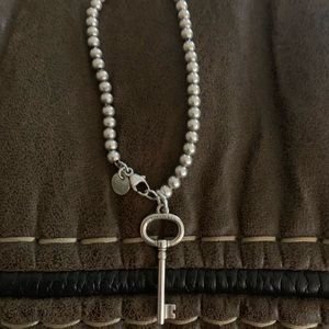 Tiffany & Co beaded bracelet with charm
